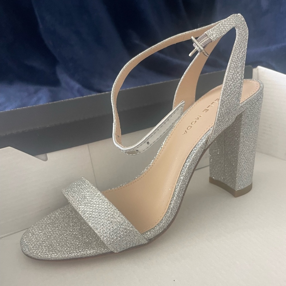Never worn: gorgeous Pelle Moda silver sparkling heels.